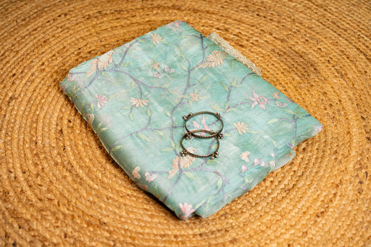 Glass Tissue saree with floral and nature-inspired motifs embroidery