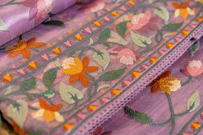 Glass Tissue saree with Parsi jaal work — floral and nature-inspired motifs,
